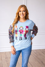 SG Array Live Nutcrackers on Blue Sweatshirt with Sequin Sleeves