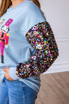 SG Array Live Nutcrackers on Blue Sweatshirt with Sequin Sleeves