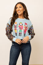 SG Array Live Nutcrackers on Blue Sweatshirt with Sequin Sleeves