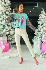 SG Array Live Nutcrackers on Blue Sweatshirt with Sequin Sleeves