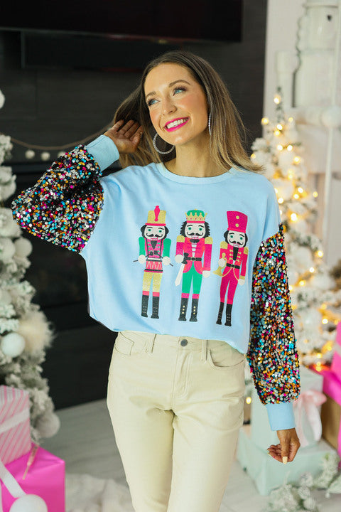 SG Array Live Nutcrackers on Blue Sweatshirt with Sequin Sleeves